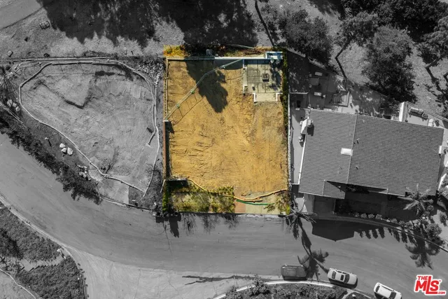 an aerial view of a swimming pool