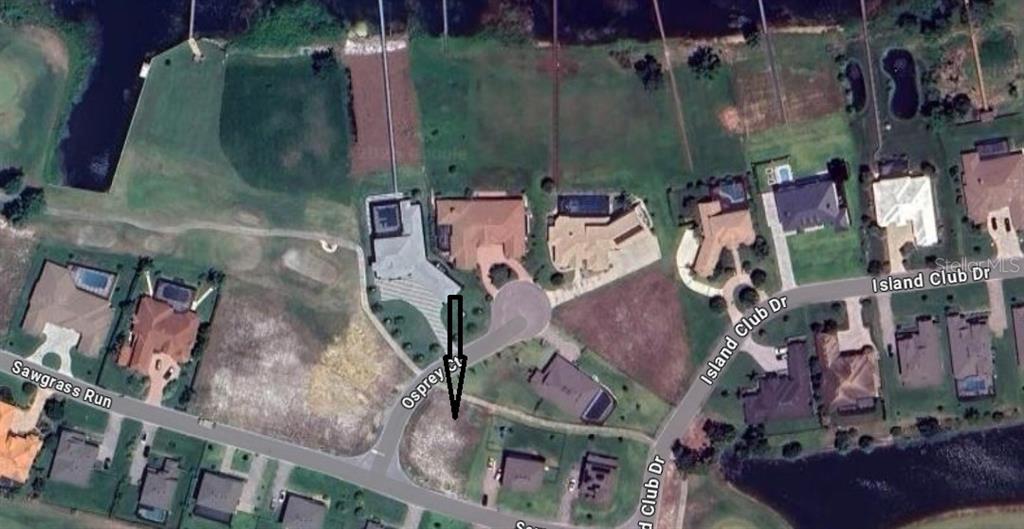 Sawgrass Run Tavares, FL 32778 - Photo 2 of 18 an aerial view of waterside residential houses