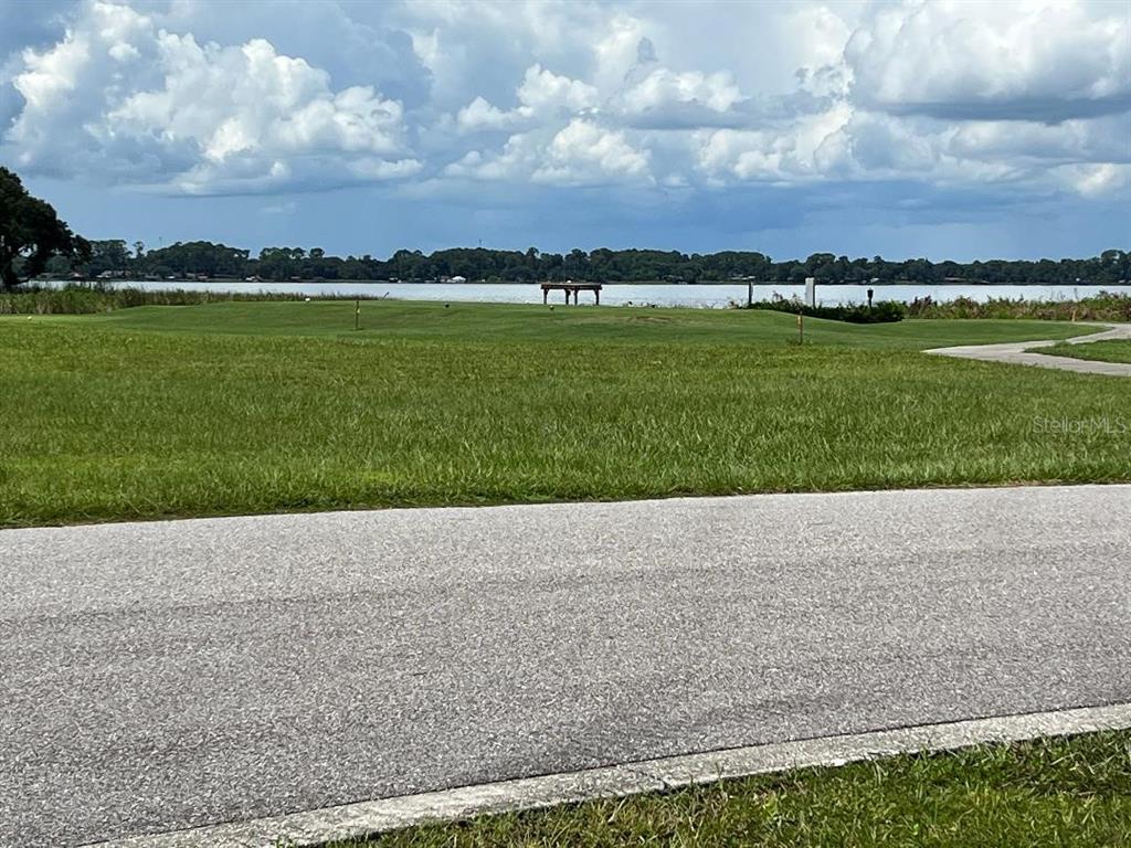 Sawgrass Run Tavares, FL 32778 - Photo 3 of 18 a view of building with ocean view