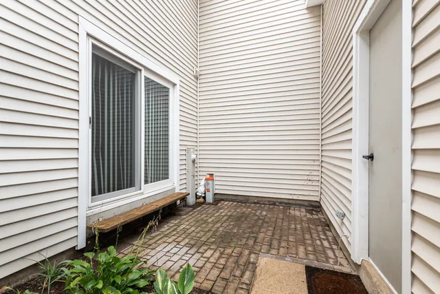 a view of a porch with a bench