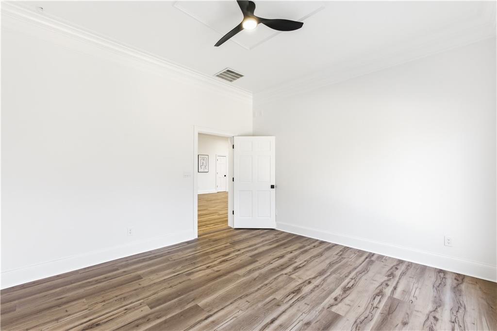 2390 Peachtree Road Cumming, GA 30041 - Photo 44 of 82 a view of empty room with wooden floor