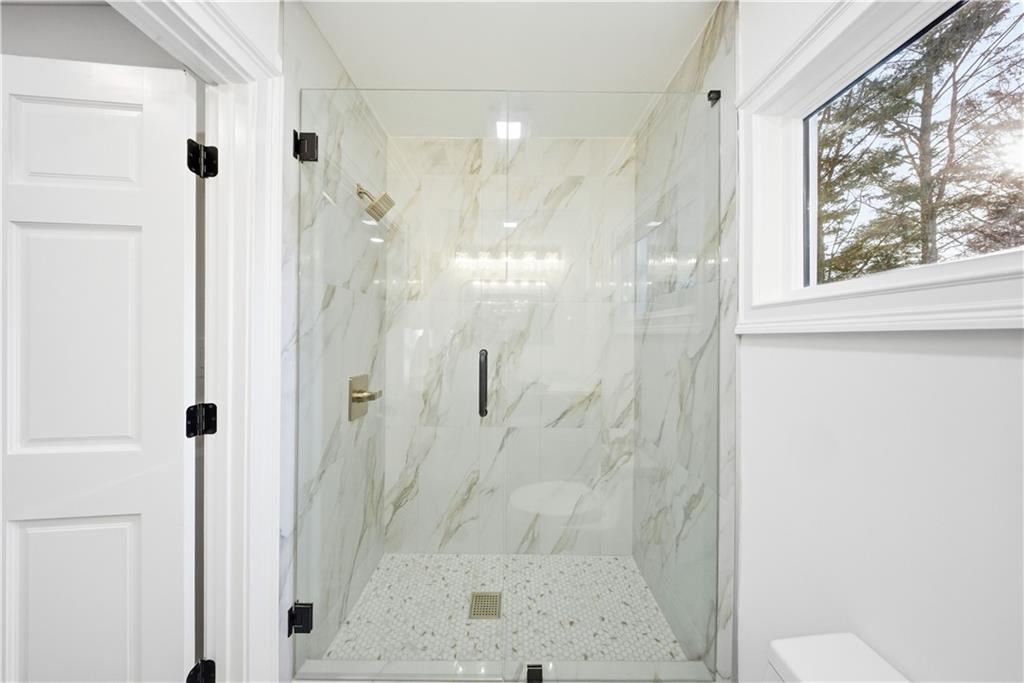2390 Peachtree Road Cumming, GA 30041 - Photo 45 of 82 a bathroom with a shower
