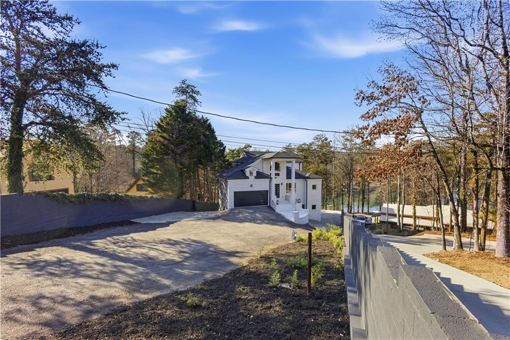 2390 Peachtree Road Cumming, GA 30041 - Photo 72 of 82 a view of a yard with a house