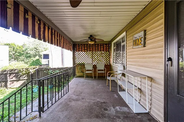 a view of a house with a street