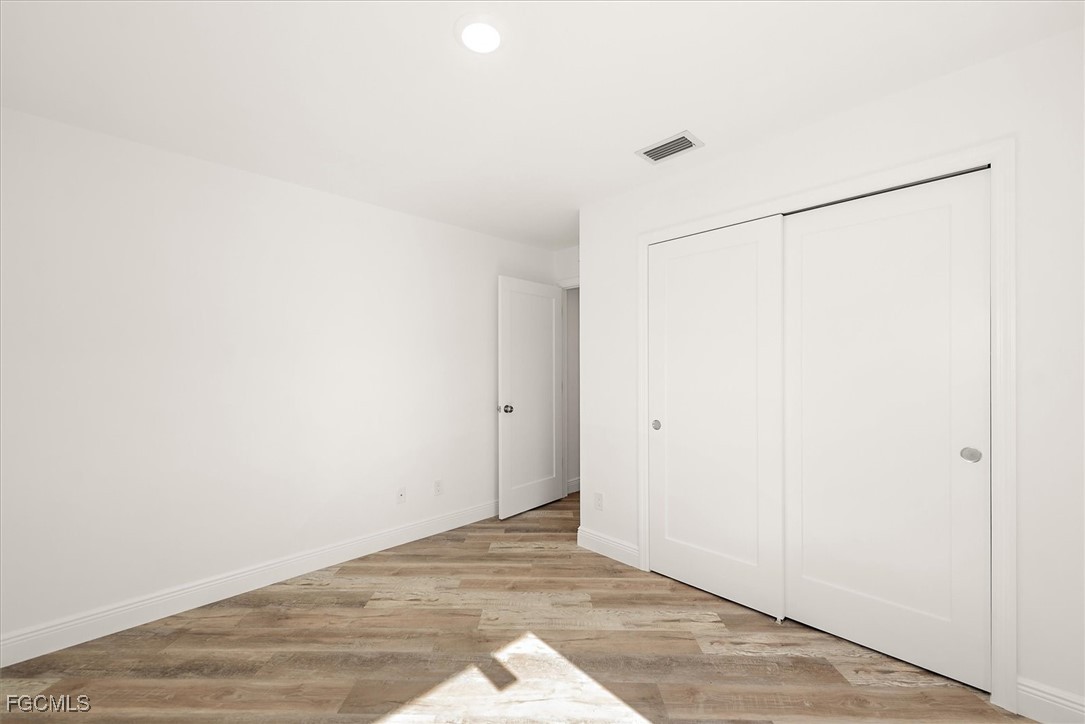 802 North Avenue Lehigh Acres, FL 33972 - Photo 30 of 39 a view of an empty room