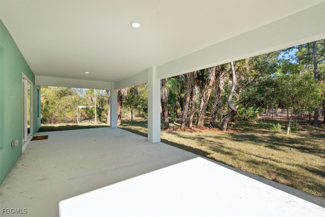 802 North Avenue Lehigh Acres, FL 33972 - Photo 7 of 39 a view of a room with large windows
