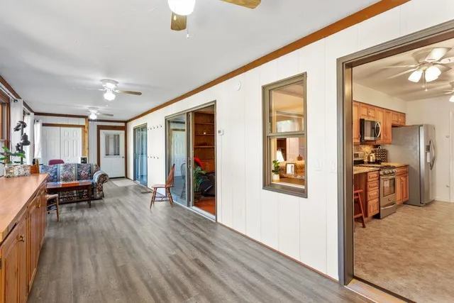 a view of a living room and dining room