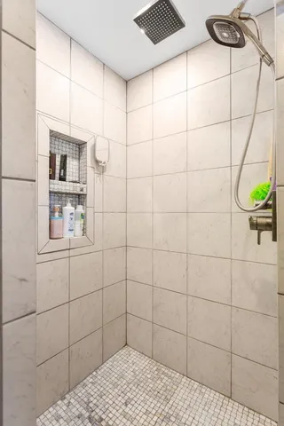 a bathroom with a sink and a shower