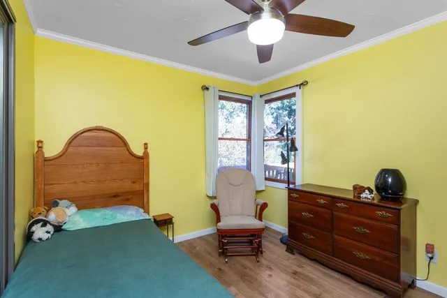 a bathroom with a sink vanity and a toilet