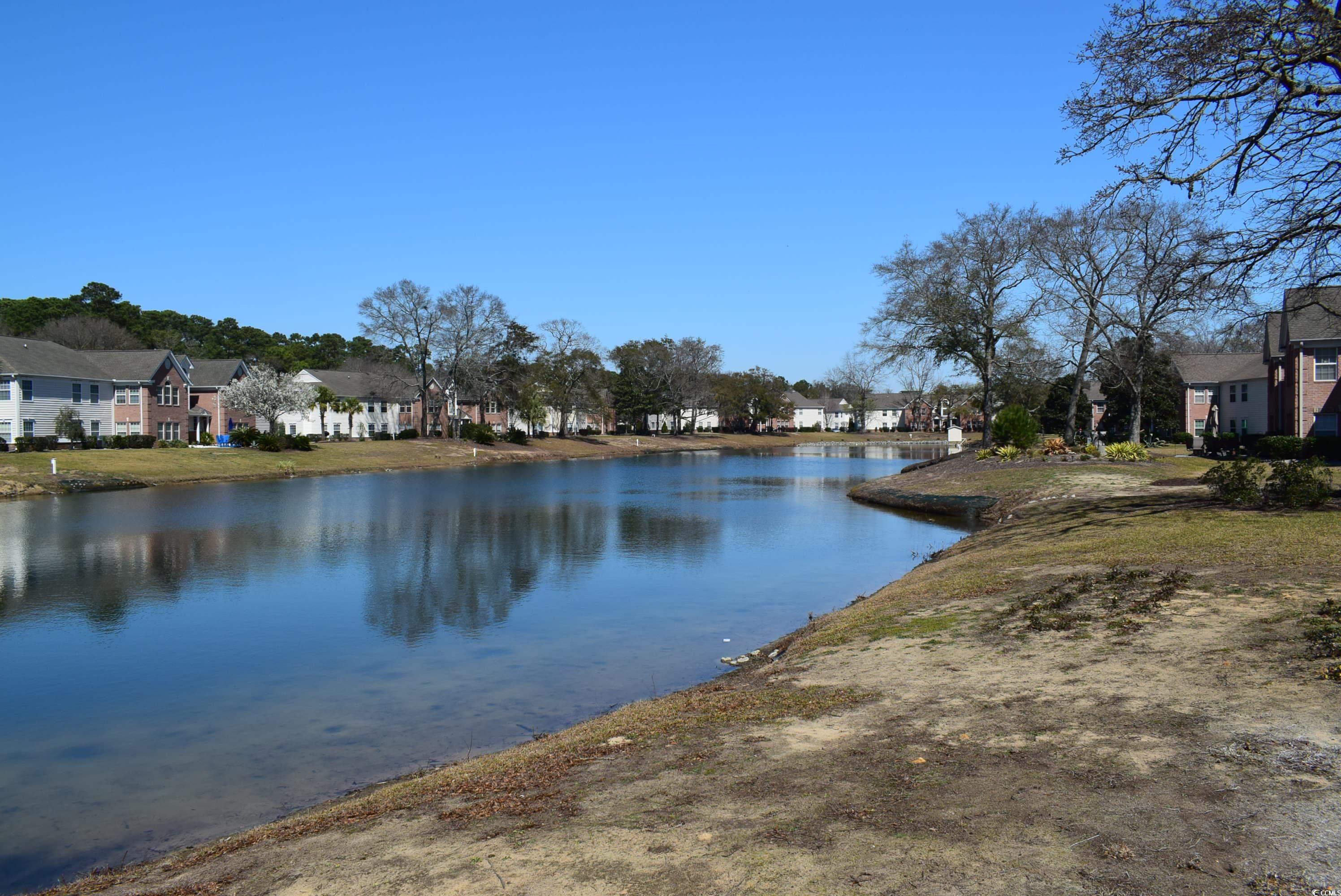 4300 Lotus Court, Unit G Murrells Inlet, SC 29576 - Photo 23 of 27 View of water feature with a residential view