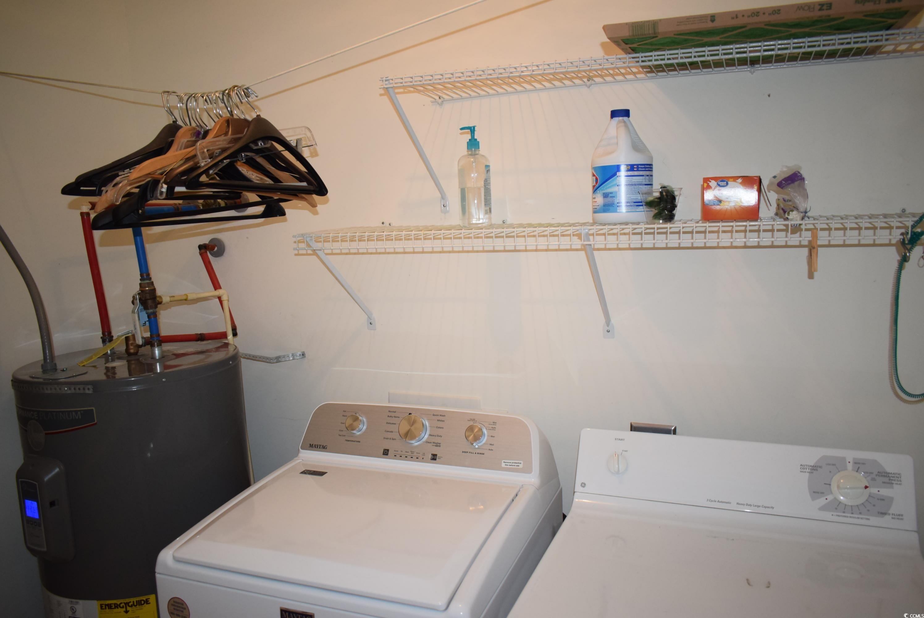 4300 Lotus Court, Unit G Murrells Inlet, SC 29576 - Photo 10 of 27 Laundry room featuring independent washer and dryer, water heater, and laundry area