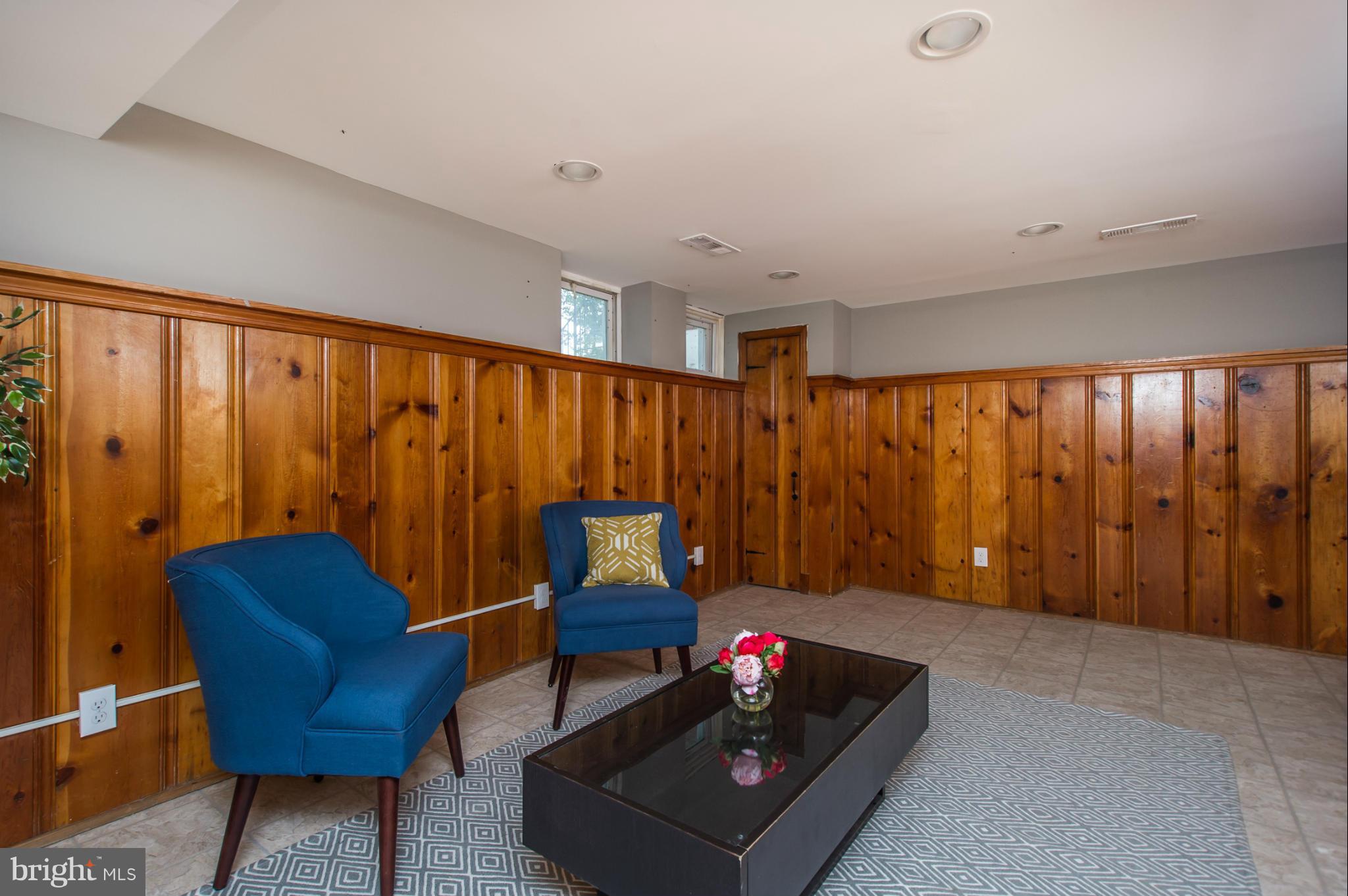 7841 Harold Road Baltimore, MD 21222 - Photo 22 of 30 a living room with furniture and a window