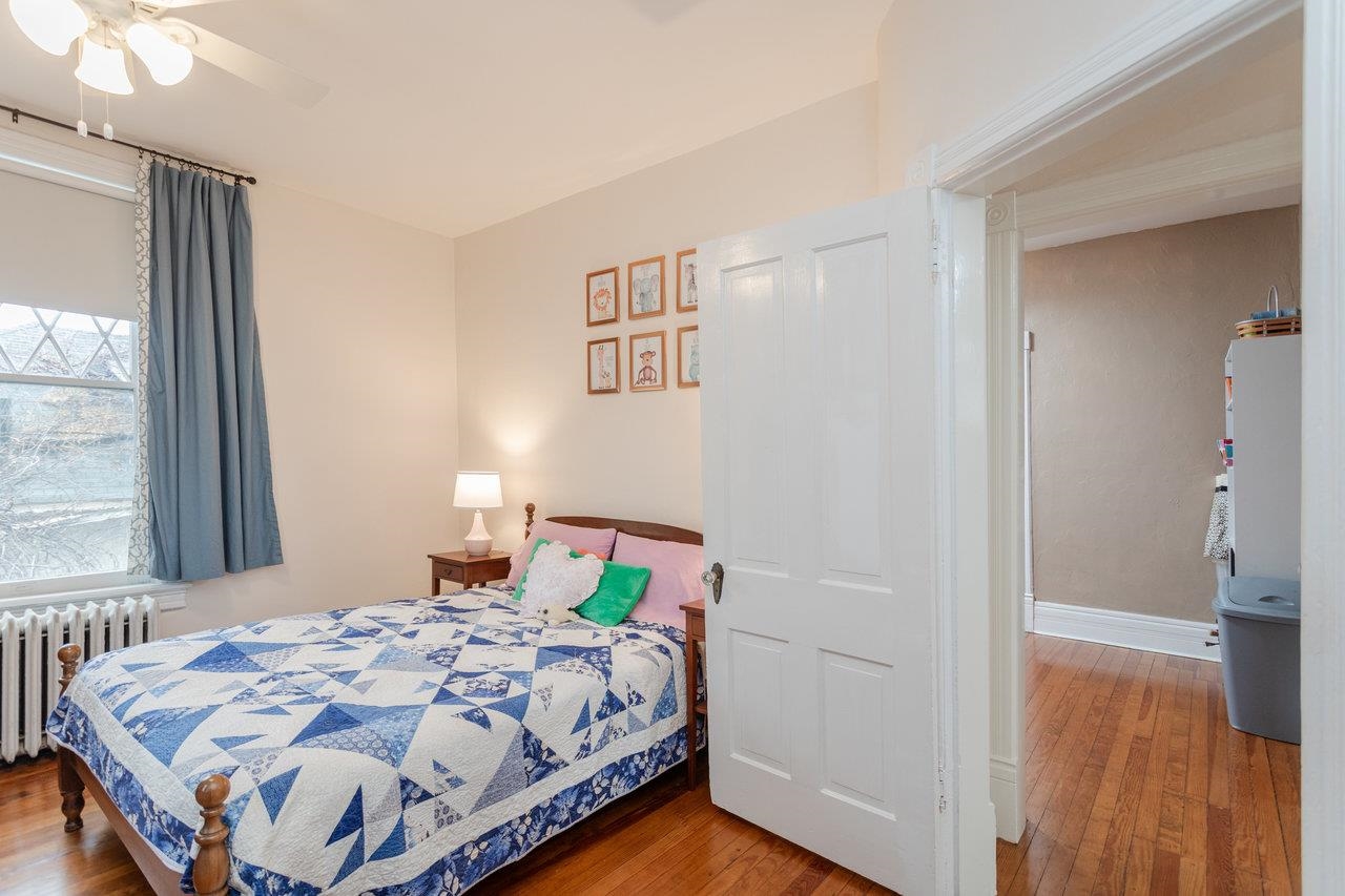 321 Franklin Street Harrisonburg, VA 22801 - Photo 35 of 54 a bedroom with a bed and a window