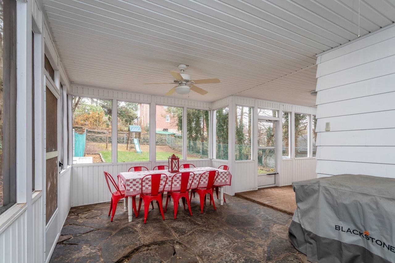321 Franklin Street Harrisonburg, VA 22801 - Photo 40 of 54 a view of a dining room with furniture large windows and wooden floor