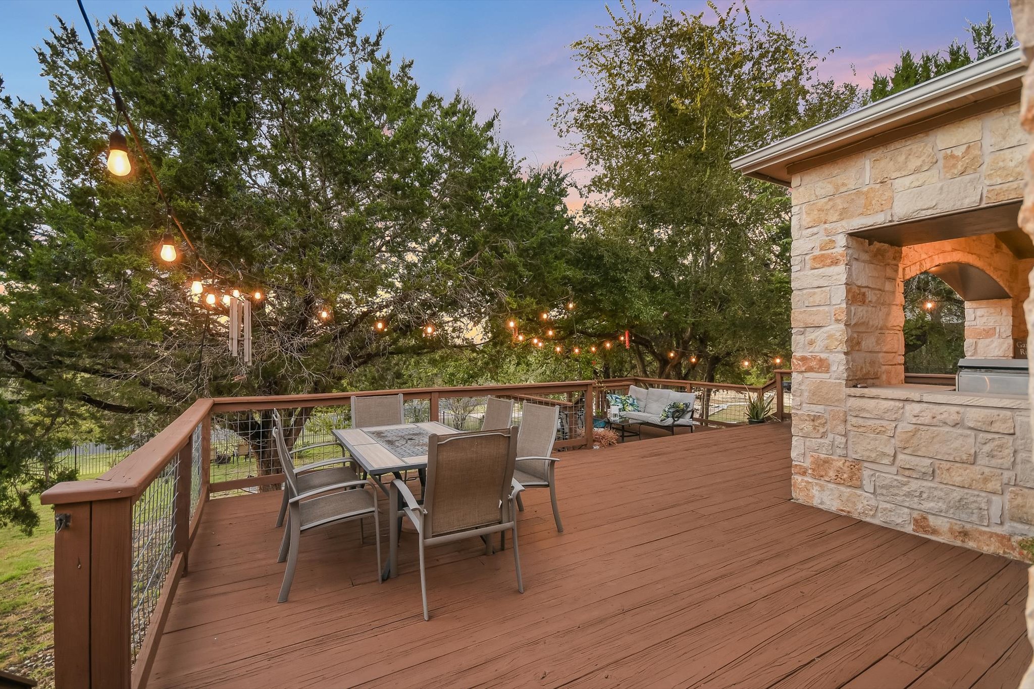300 Wesley Ridge Drive Spicewood, TX 78669 - Photo 32 of 40 Stone accents and views of the surrounding trees.