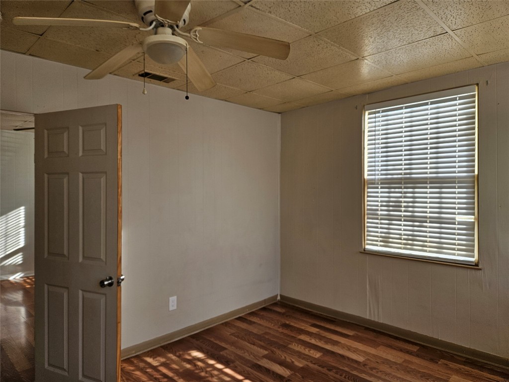 501 Burnet Street Manor, TX 78653 - Photo 4 of 22 a view of a room that has a window in it