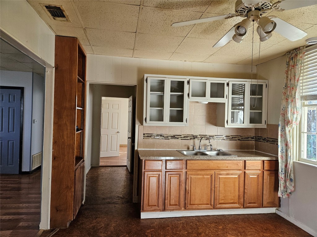 501 Burnet Street Manor, TX 78653 - Photo 7 of 22 a view of an entryway with chandelier