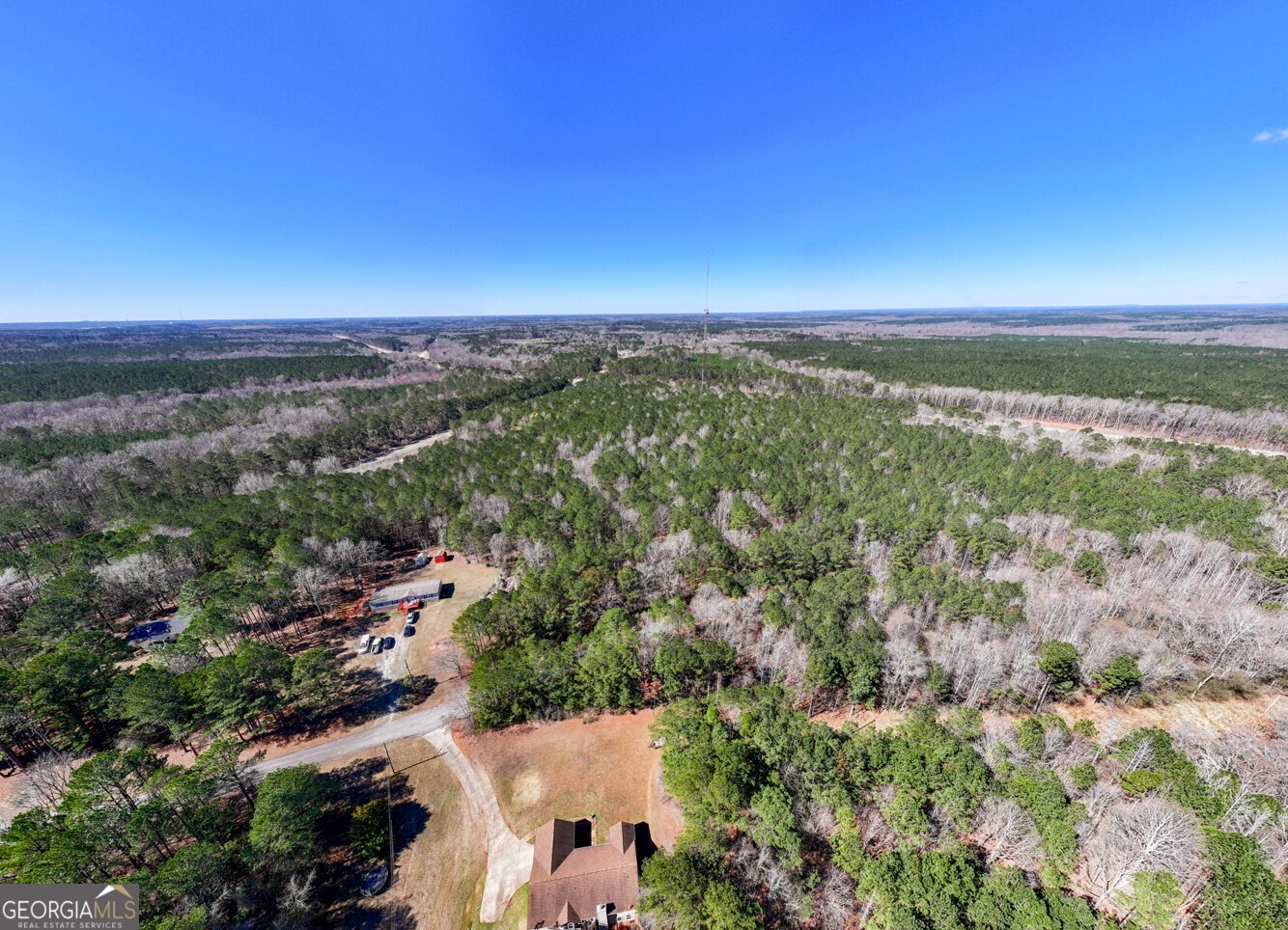 0 Hines Road, Unit TRACT A LaGrange, GA 30241 - Photo 9 of 13 an aerial view of residential houses with outdoor space and trees