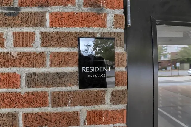 a sign that is on the wall of a building