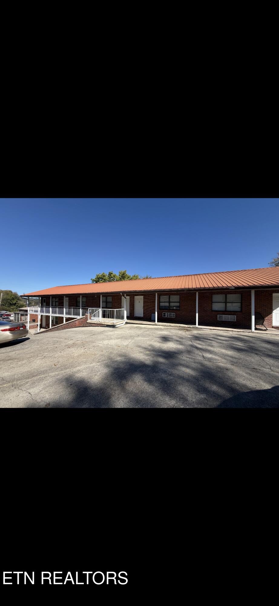 128 South 3rd Street, Unit 23 Kingston, TN 37763 - Photo 1 of 6 a view of an outdoor space