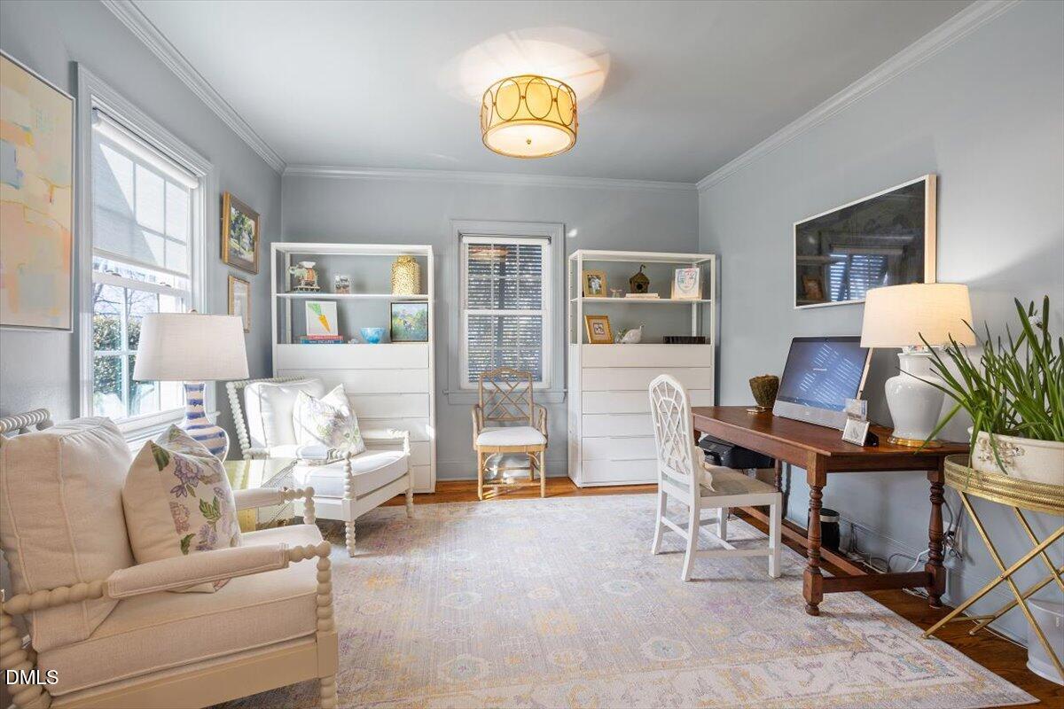 2104 Reaves Drive Raleigh, NC 27608 - Photo 17 of 29 a living room with furniture lamp and a window