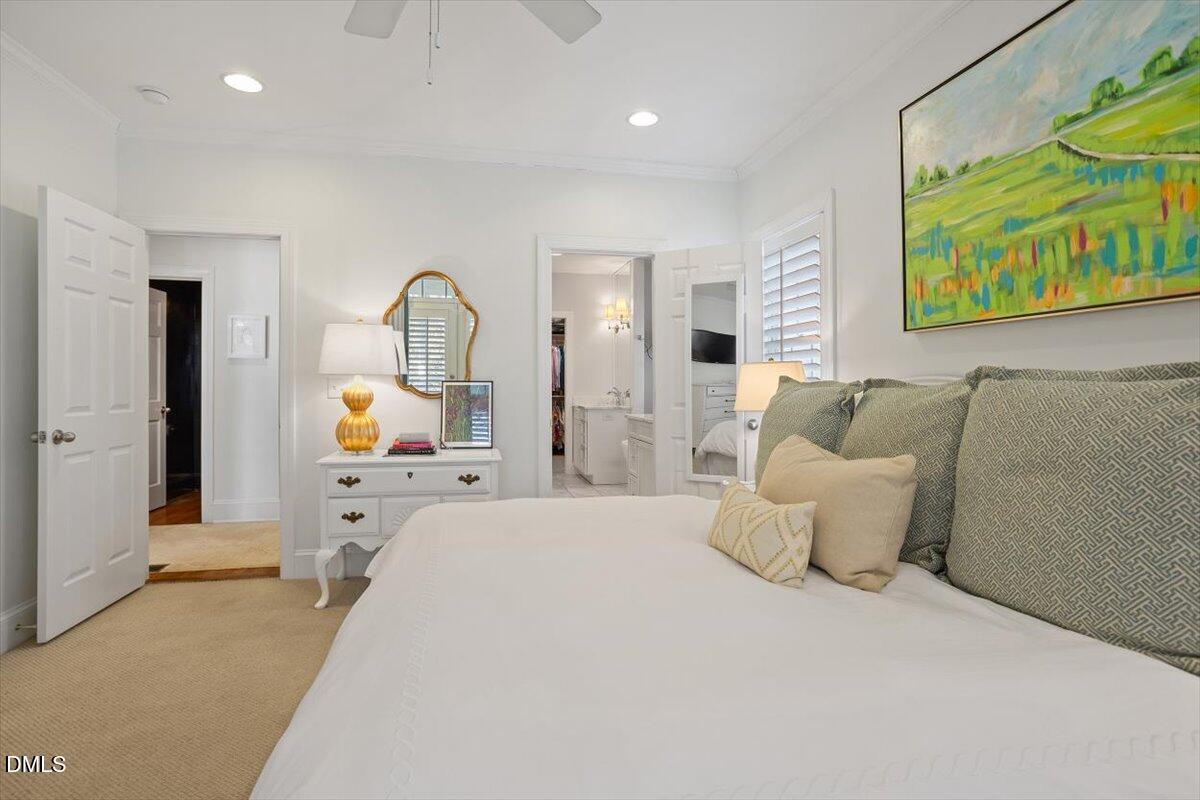 2104 Reaves Drive Raleigh, NC 27608 - Photo 19 of 29 a large white bed in a white room