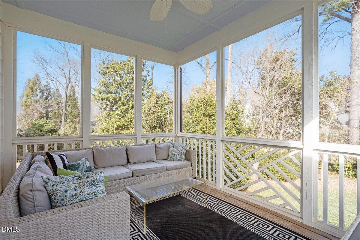 2104 Reaves Drive Raleigh, NC 27608 - Photo 27 of 29 a living room with furniture and a large window