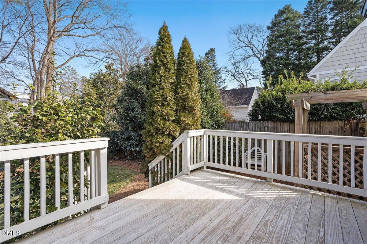 2104 Reaves Drive Raleigh, NC 27608 - Photo 28 of 29 a view of a wooden roof deck