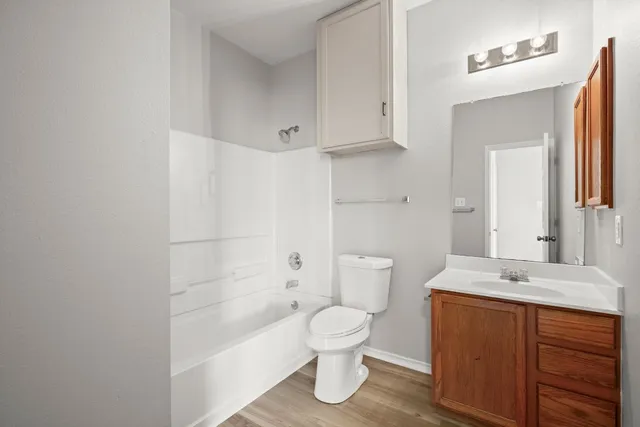 a bathroom with a sink toilet a shower and bathtub