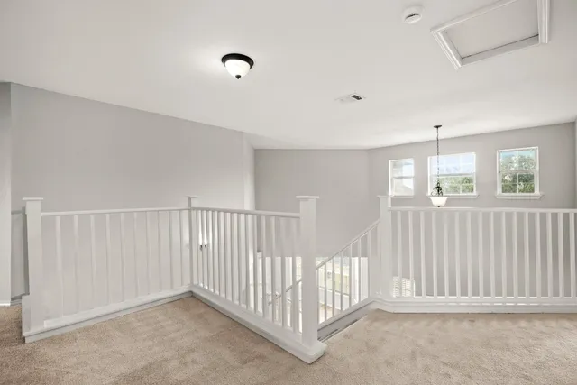 a view of a room with windows