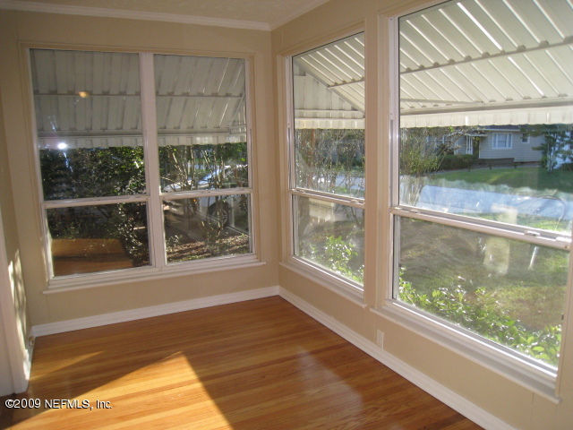 1759 Mayfair Road Jacksonville, FL 32207 - Photo 5 of 17 a view of a glass door with a floor to ceiling window