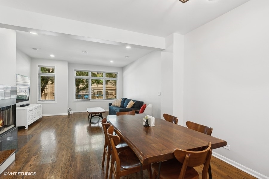 1455 South Indiana Avenue Chicago, IL 60605 - Photo 6 of 27 a view of a dining room with furniture window and wooden floor