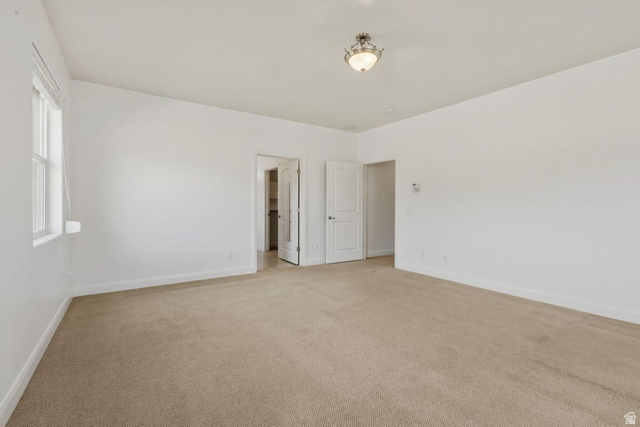 1001 Pine Valley Road Pine Valley, UT 84781 - Photo 33 of 49 Unfurnished bedroom with light colored carpet and baseboards
