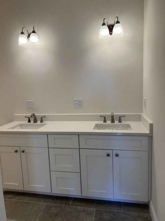 41 Brookside Avenue Webster, MA 01570 - Photo 14 of 17 a bathroom with a sink and cabinets