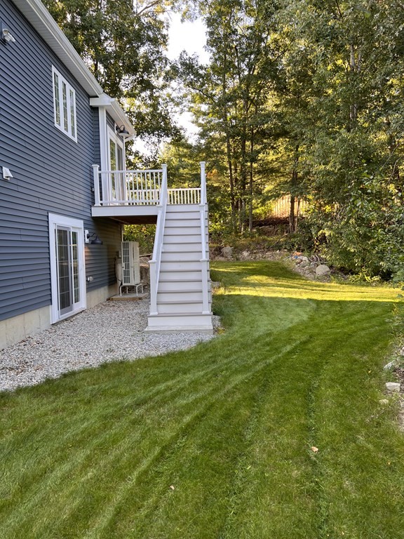 41 Brookside Avenue Webster, MA 01570 - Photo 5 of 17 a view of a house with a yard