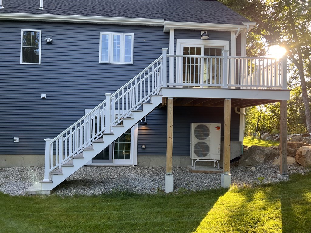 41 Brookside Avenue Webster, MA 01570 - Photo 6 of 17 a front view of a house with a yard