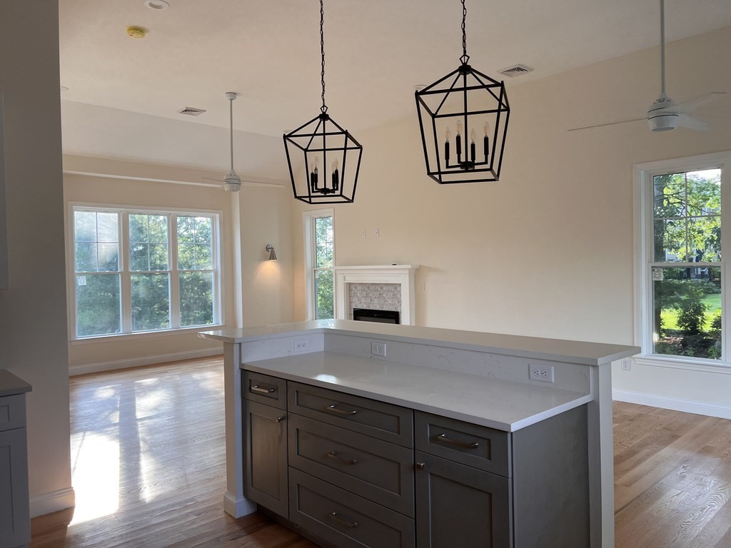41 Brookside Avenue Webster, MA 01570 - Photo 9 of 17 a view of a room with a window and wooden floor