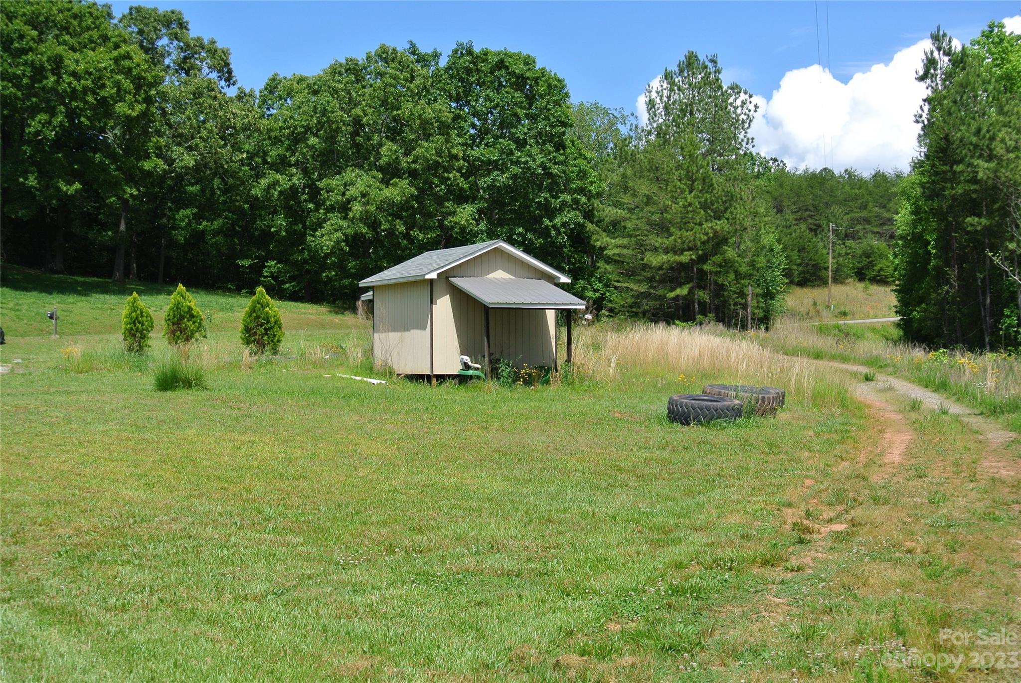 290 Broad River Rutherfordton, NC 28139 - Photo 7 of 11 a house view with a garden space