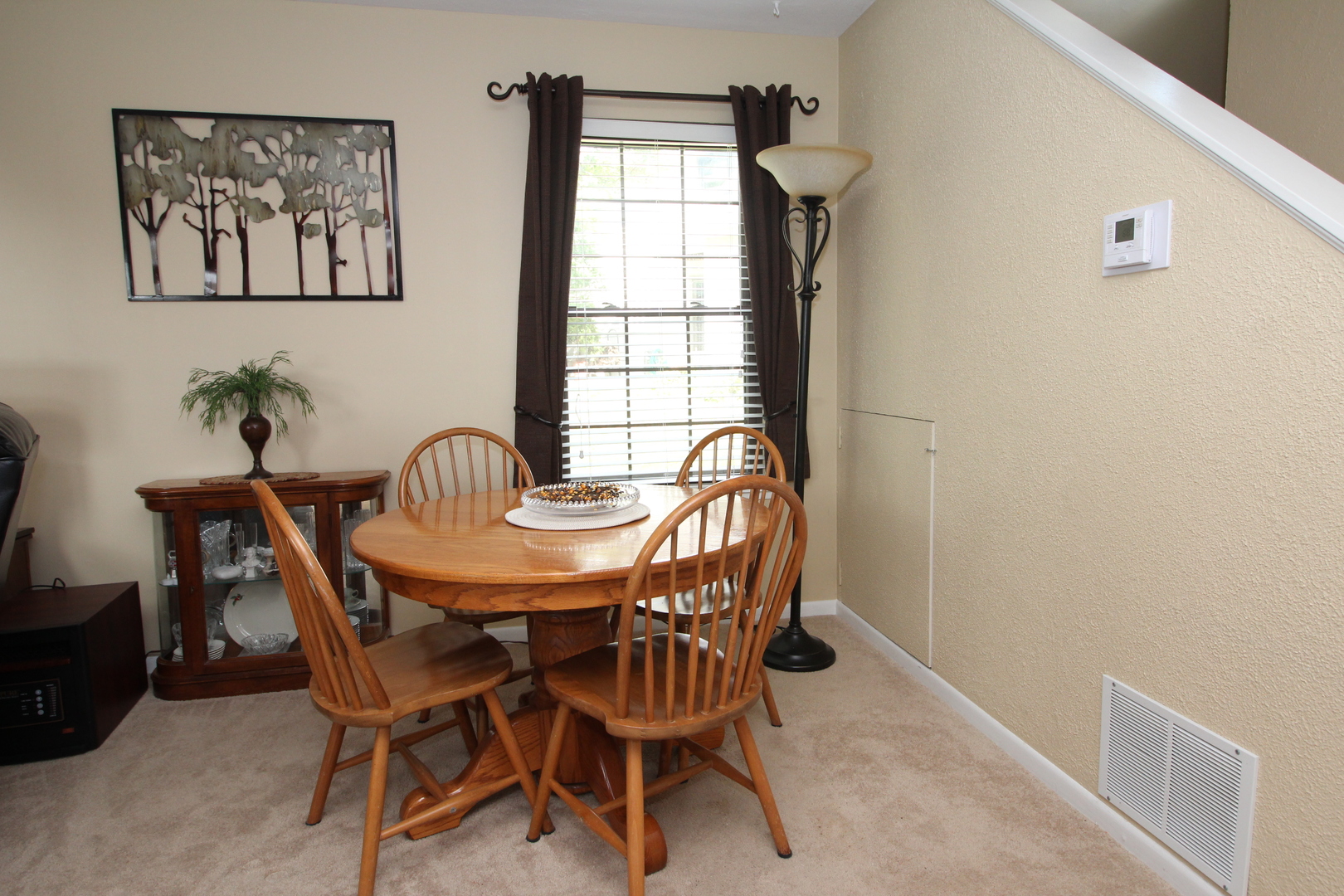 766 Chandler Road Gurnee, IL 60031 - Photo 5 of 24 a view of a dining room with furniture and window
