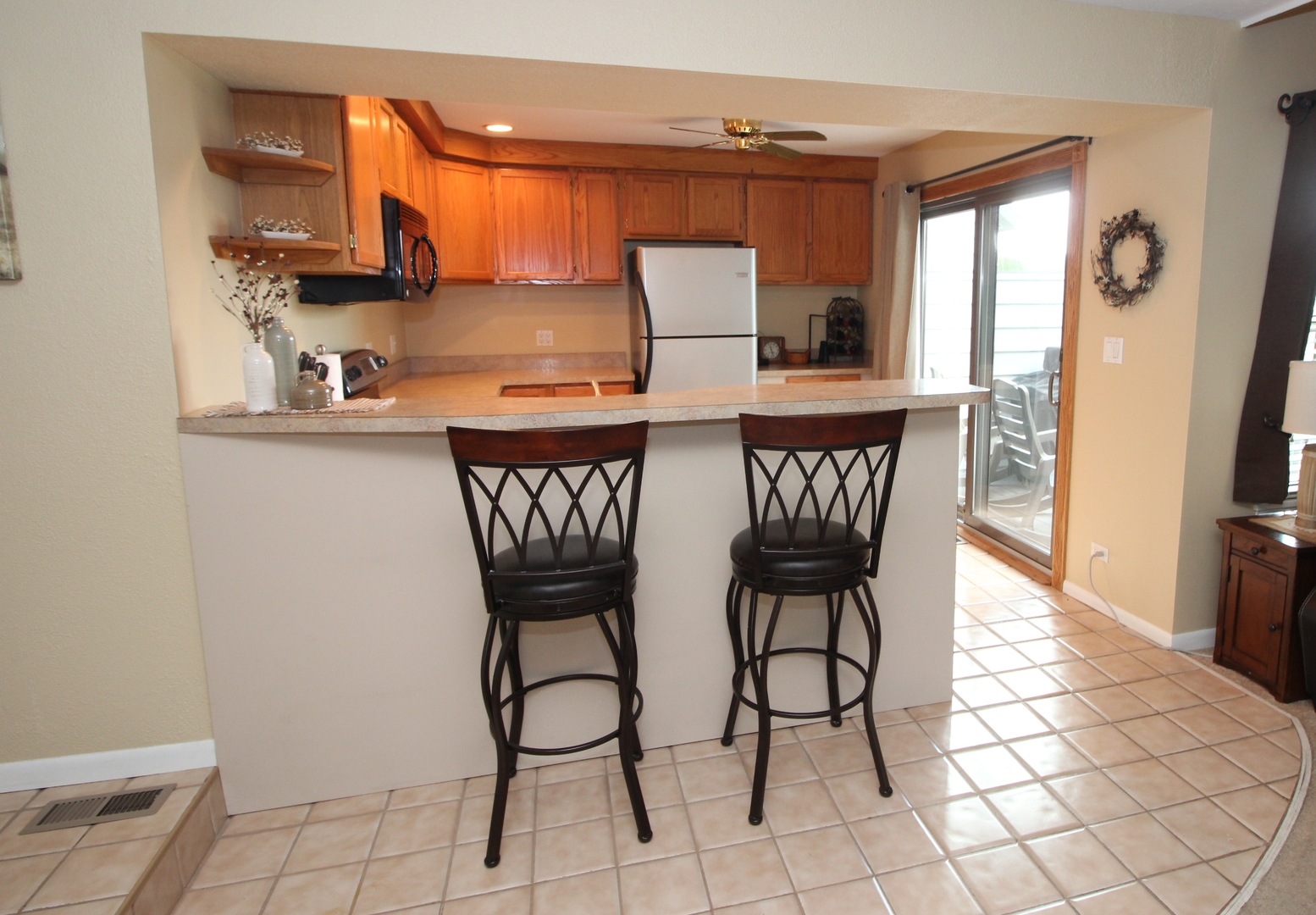766 Chandler Road Gurnee, IL 60031 - Photo 8 of 24 a dining room with furniture and window