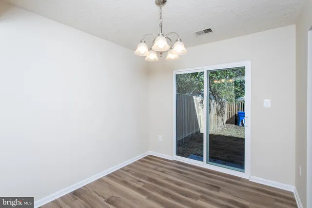 a view of an empty room with window