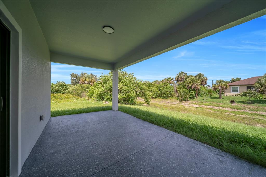 2328 Irondale Road North Port, FL 34287 - Photo 36 of 45 a view of a yard with an outdoor space