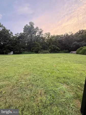 a view of an outdoor space and a yard