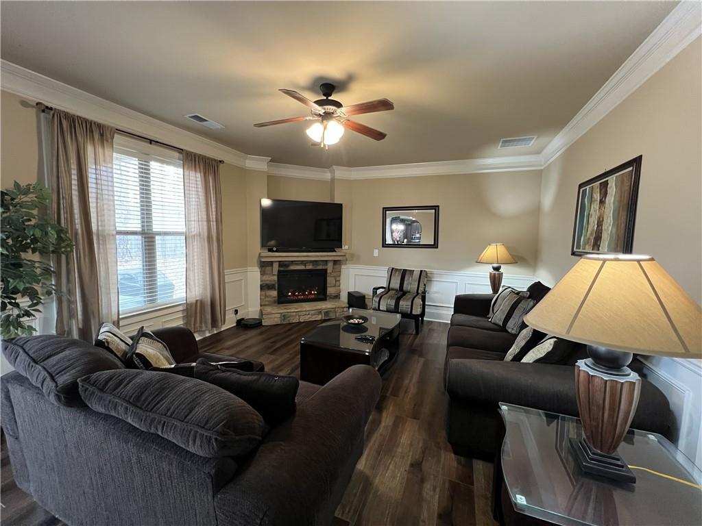 140 Providence Parkway Covington, GA 30014 - Photo 13 of 24 a living room with furniture and a flat screen tv