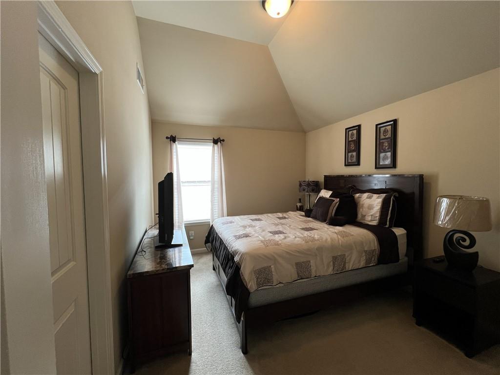 140 Providence Parkway Covington, GA 30014 - Photo 16 of 24 a bedroom with a bed and window
