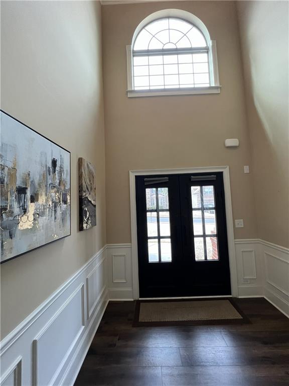140 Providence Parkway Covington, GA 30014 - Photo 5 of 24 an empty room with wooden floor and windows