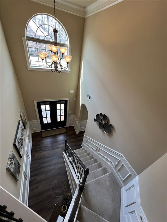 140 Providence Parkway Covington, GA 30014 - Photo 7 of 24 a view of a livingroom with wooden floor a fireplace and windows