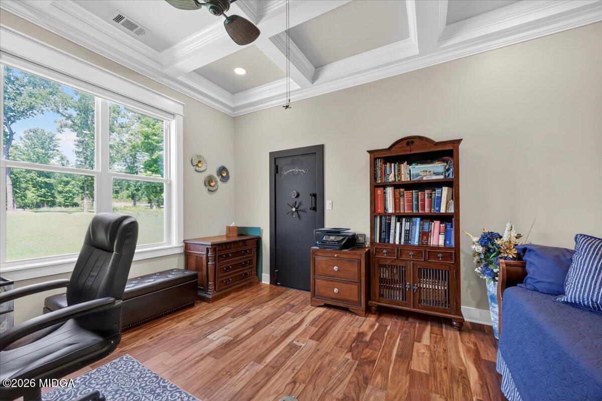 7287 Moseley Dixon Road Macon, GA 31220 - Photo 18 of 83 a view of a workspace with furniture and a window