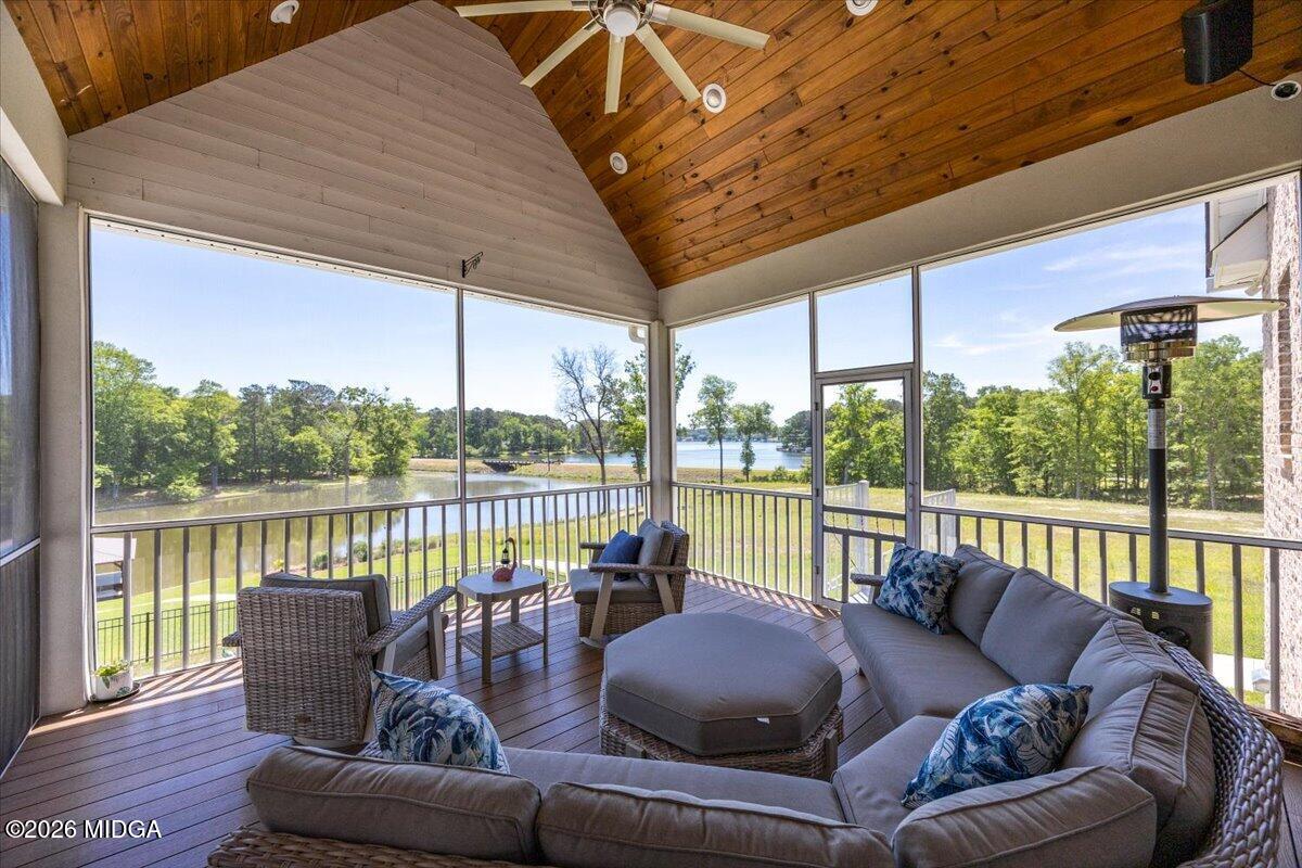 7287 Moseley Dixon Road Macon, GA 31220 - Photo 28 of 83 a balcony with furniture and a floor to ceiling window