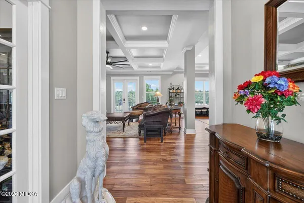 a living room with fireplace furniture and a flat screen tv